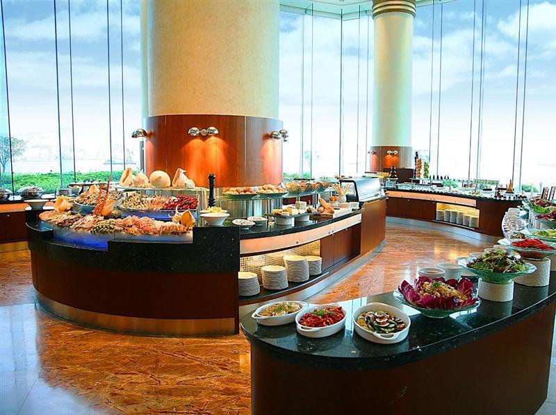 Harbour Grand Kowloon Hotel Hong Kong Exterior foto A buffet at a hotel